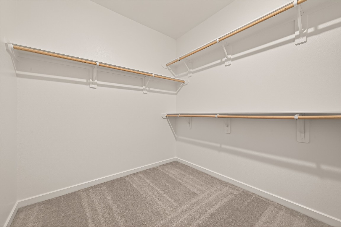 21926 Sam Raburn Drive Tomball, TX 77375 - Photo 40 of 47 a view of an empty walk in closet