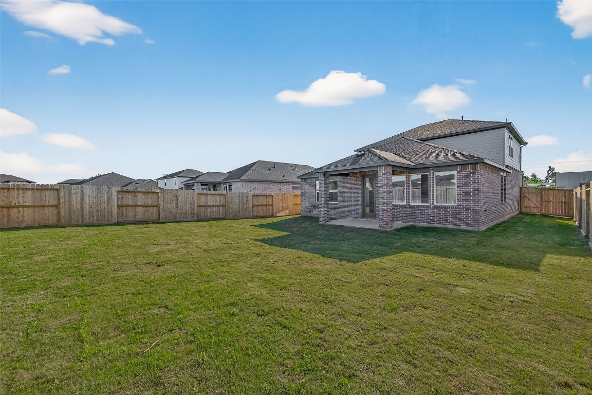 21926 Sam Raburn Drive Tomball, TX 77375 - Photo 44 of 47 a view of a house with backyard