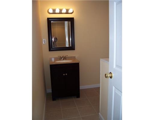 3410 Conway Wallrose Road Economy, PA 15143 - Photo 16 of 18 Full Bath. The convenient lower level bath has a walk in shower, single bowl sink and ceramic floor.