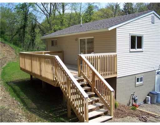 3410 Conway Wallrose Road Economy, PA 15143 - Photo 3 of 18 Exterior Front. The large, private 20 x 12 rear deck is perfect for entertaining and has plenty of room for the deck furniture.
