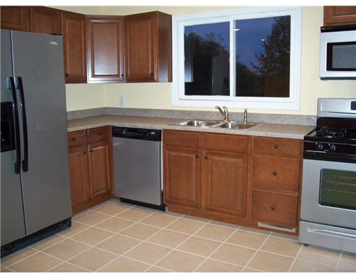 3410 Conway Wallrose Road Economy, PA 15143 - Photo 4 of 18 Kitchen. What cook wouldn t enjoy preparing the meals in this beautiful eat-in cherry kitchen complete with brand new stainless steel appliances. It has a neutral ceramic tile floor and sliders to the rear deck.
