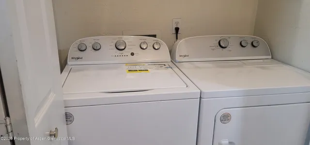 a close up view of washer and dryer