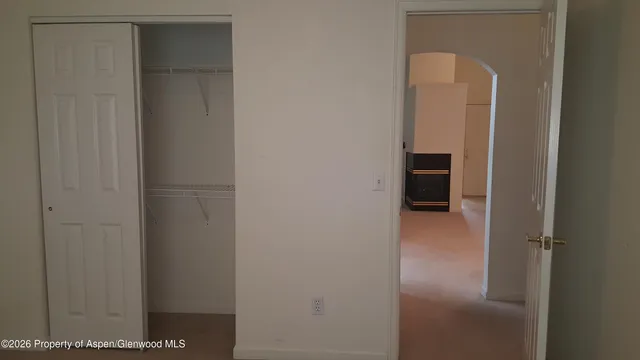 a view of a bedroom from hallway