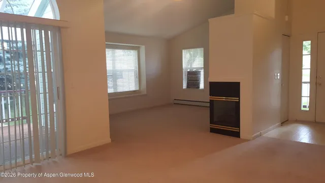 an empty room with windows