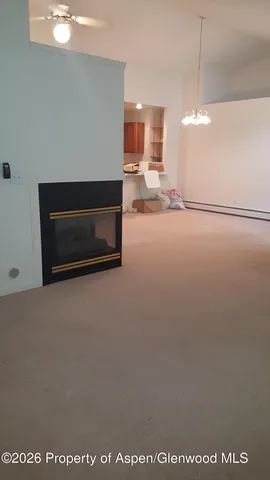 a view of kitchen and a window