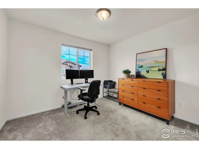 a room with furniture and a window