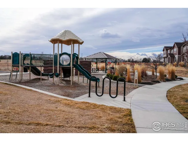 a view of a bench in a field