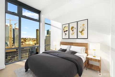 a view of dining room with furniture and wooden floor
