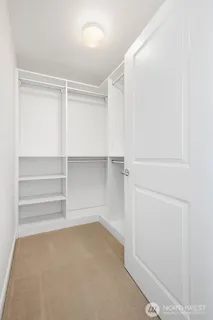 a bathroom with a granite countertop sink mirror and double