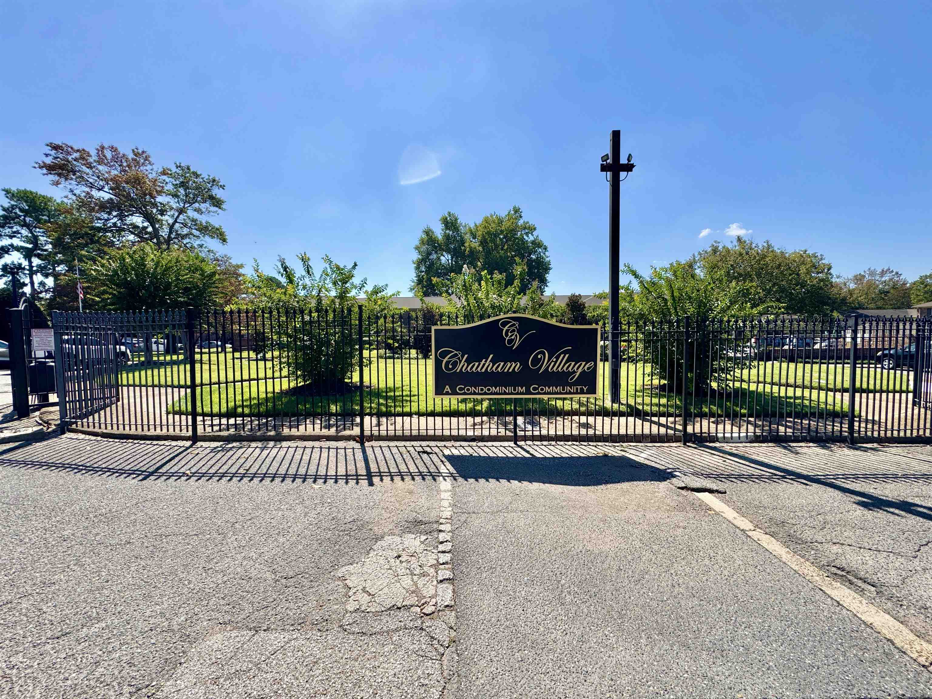 1202 Middle Court, Unit 101 Memphis, TN 38119 - Photo 1 of 24 a view of a park with iron fence