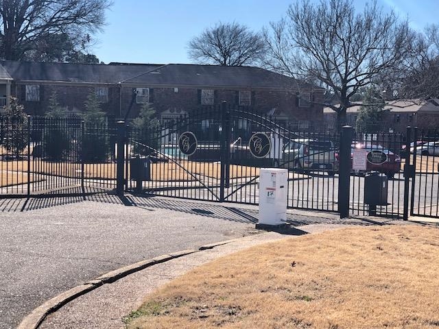 1202 Middle Court, Unit 101 Memphis, TN 38119 - Photo 15 of 24 a view of a wooden fence