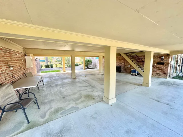 workspace with wooden floor and windows