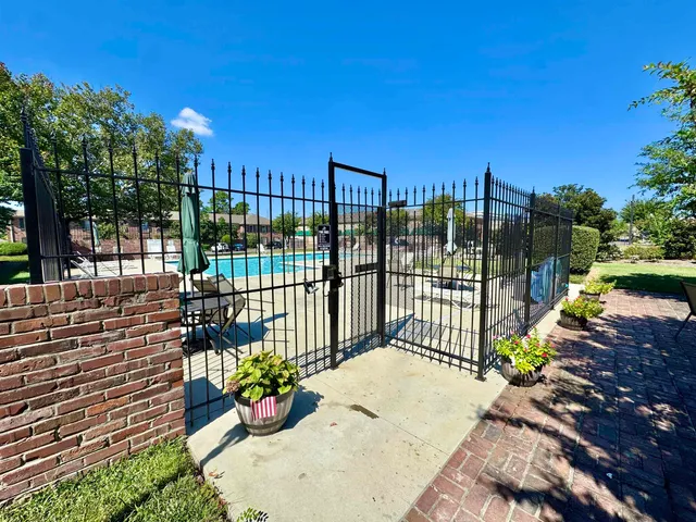 a view of a garden with patio