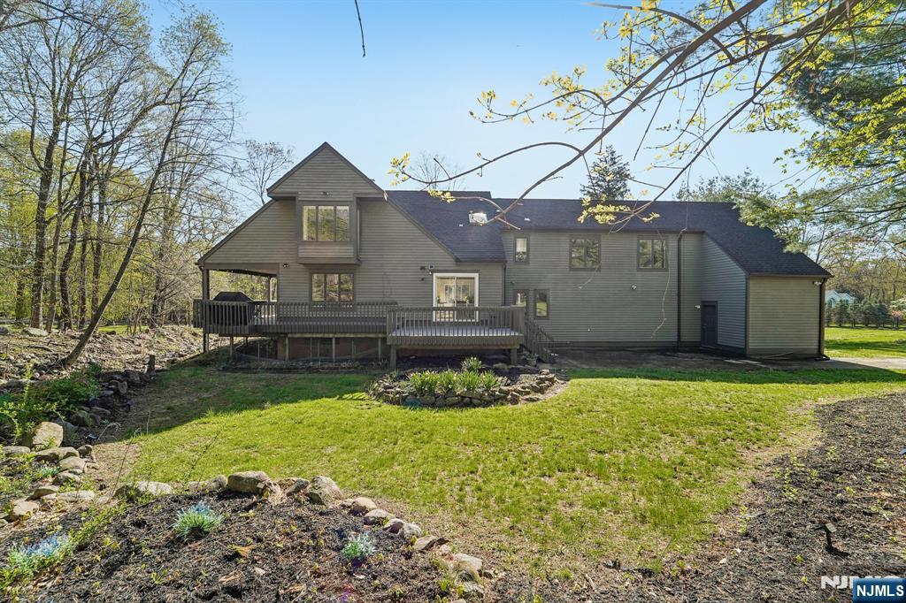 11 Carlough Road Upper Saddle River, NJ 07458 - Photo 41 of 41 a front view of house with yard and green space