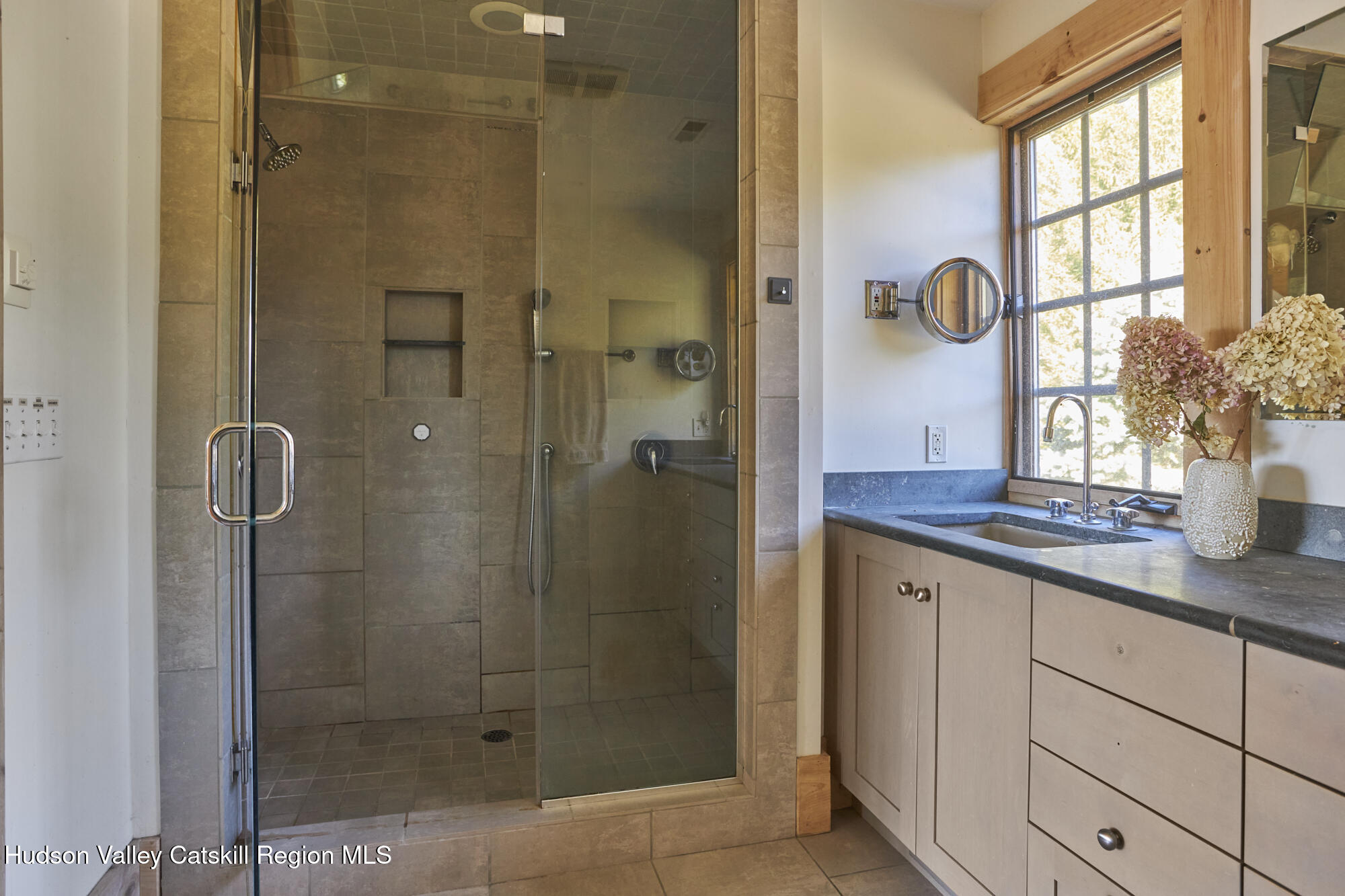 87 Kaye Road Millerton, NY 12546 - Photo 30 of 46 a bathroom with a glass shower door and a sink
