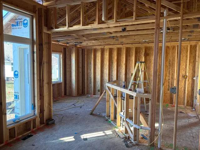 a view of a door with wooden fence