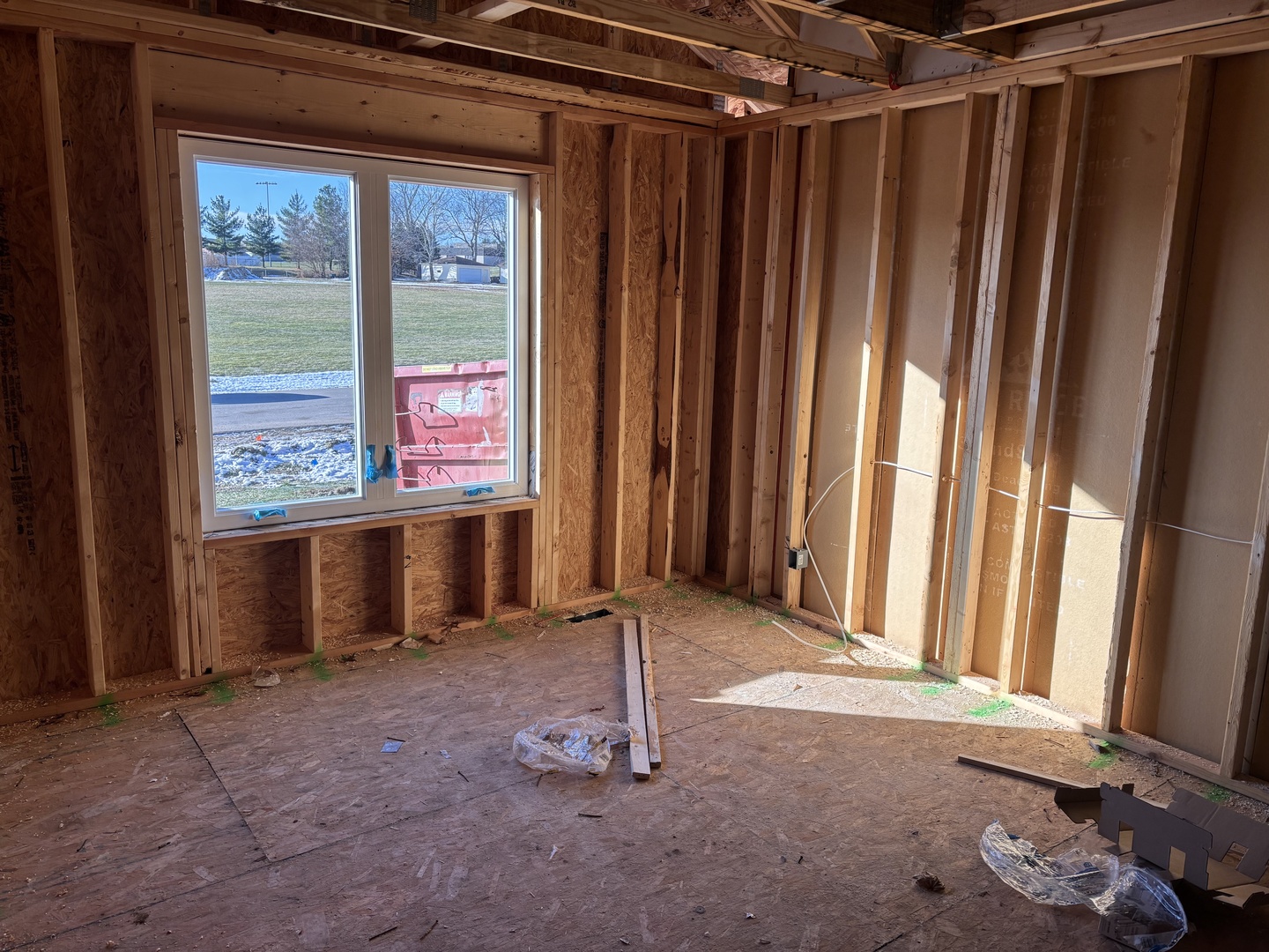 311 East Pershing Road Stillman Valley, IL 61084 - Photo 18 of 21 a view of a room with wooden floor and a window