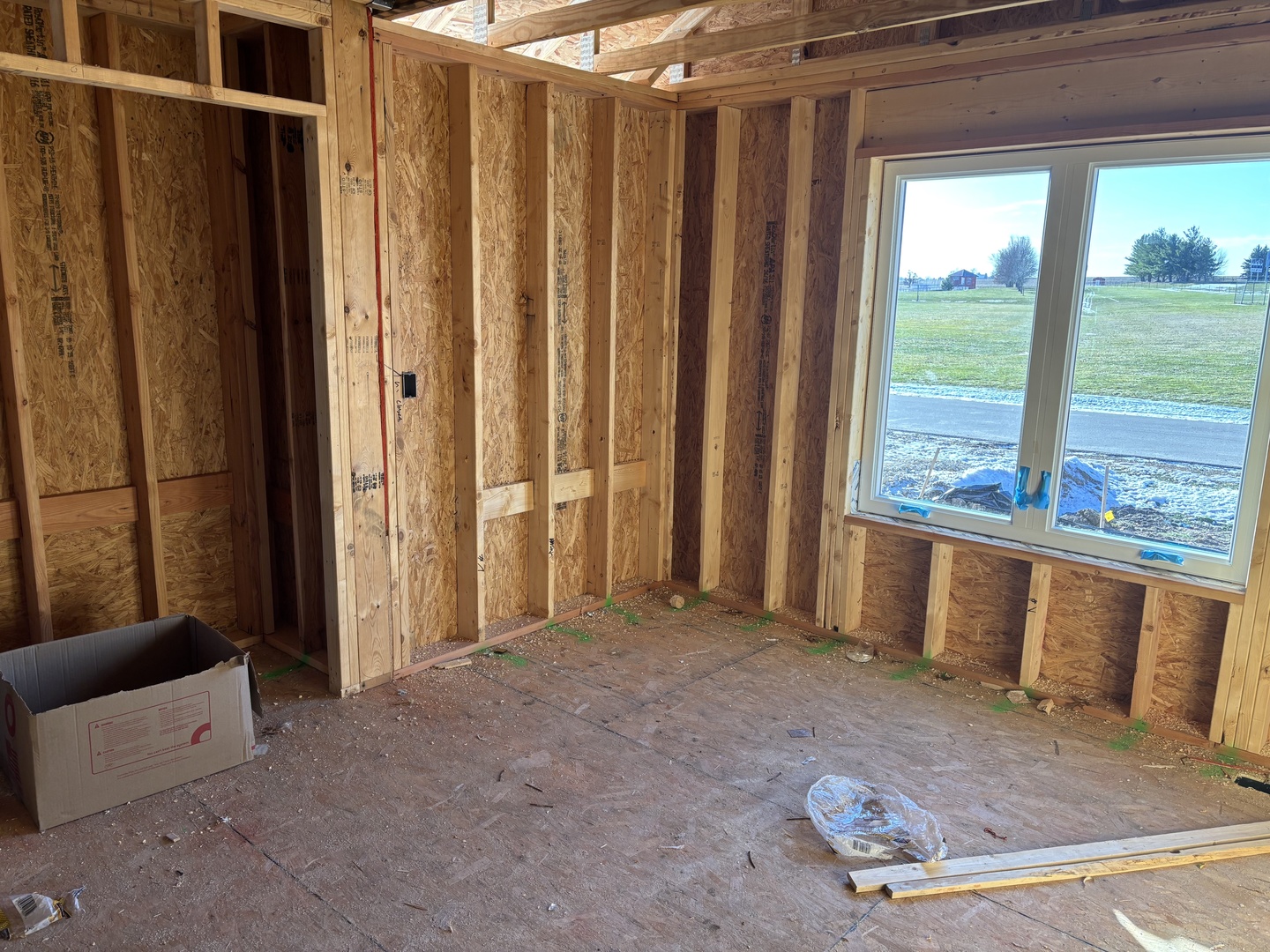 311 East Pershing Road Stillman Valley, IL 61084 - Photo 19 of 21 a view of a porch with a couch and wooden floor