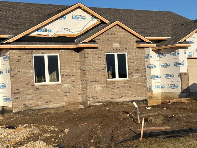 a front view of a house with patio