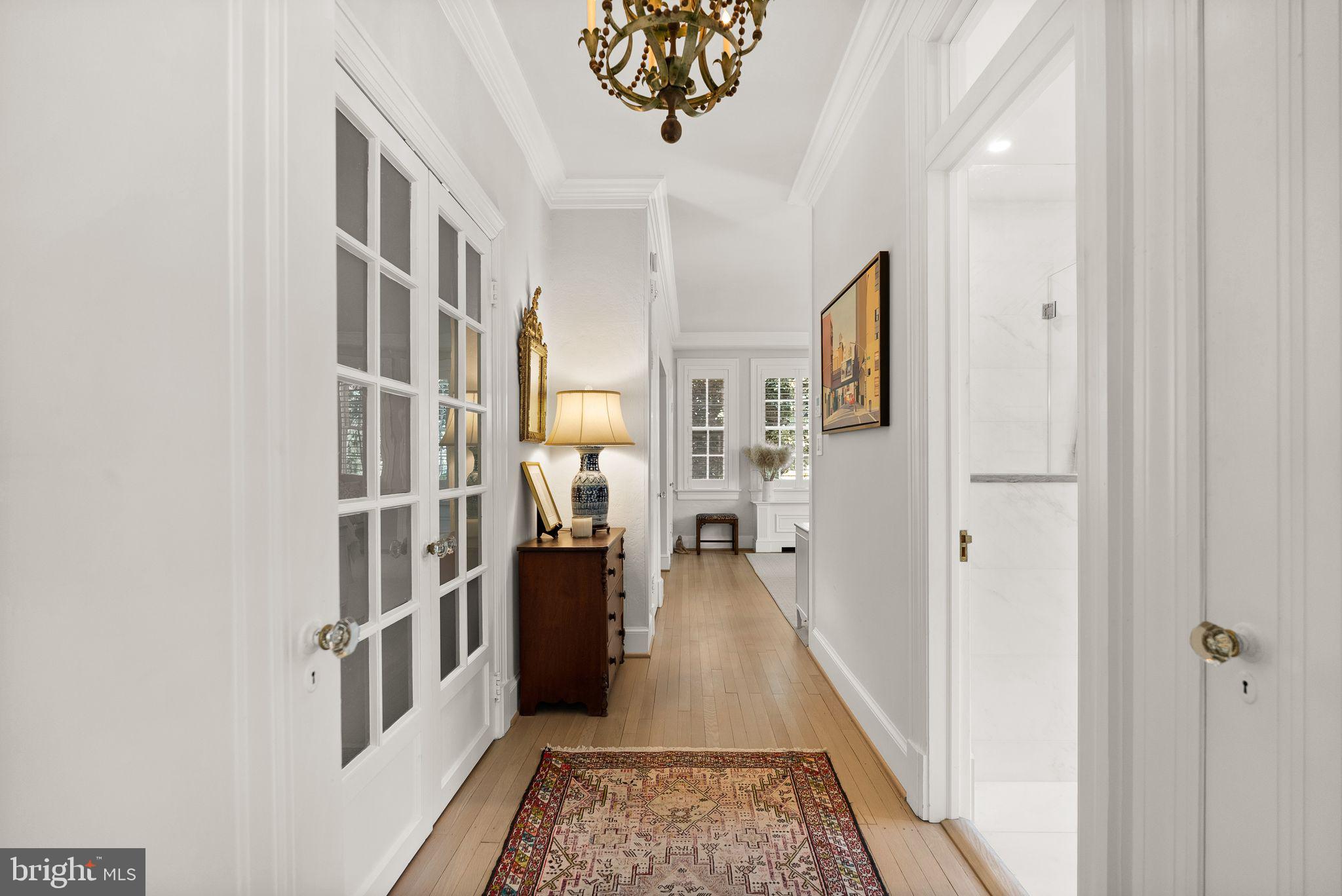 1661 Crescent Place Northwest, Unit 305 Washington, DC 20009 - Photo 14 of 25 a view of a hallway with windows