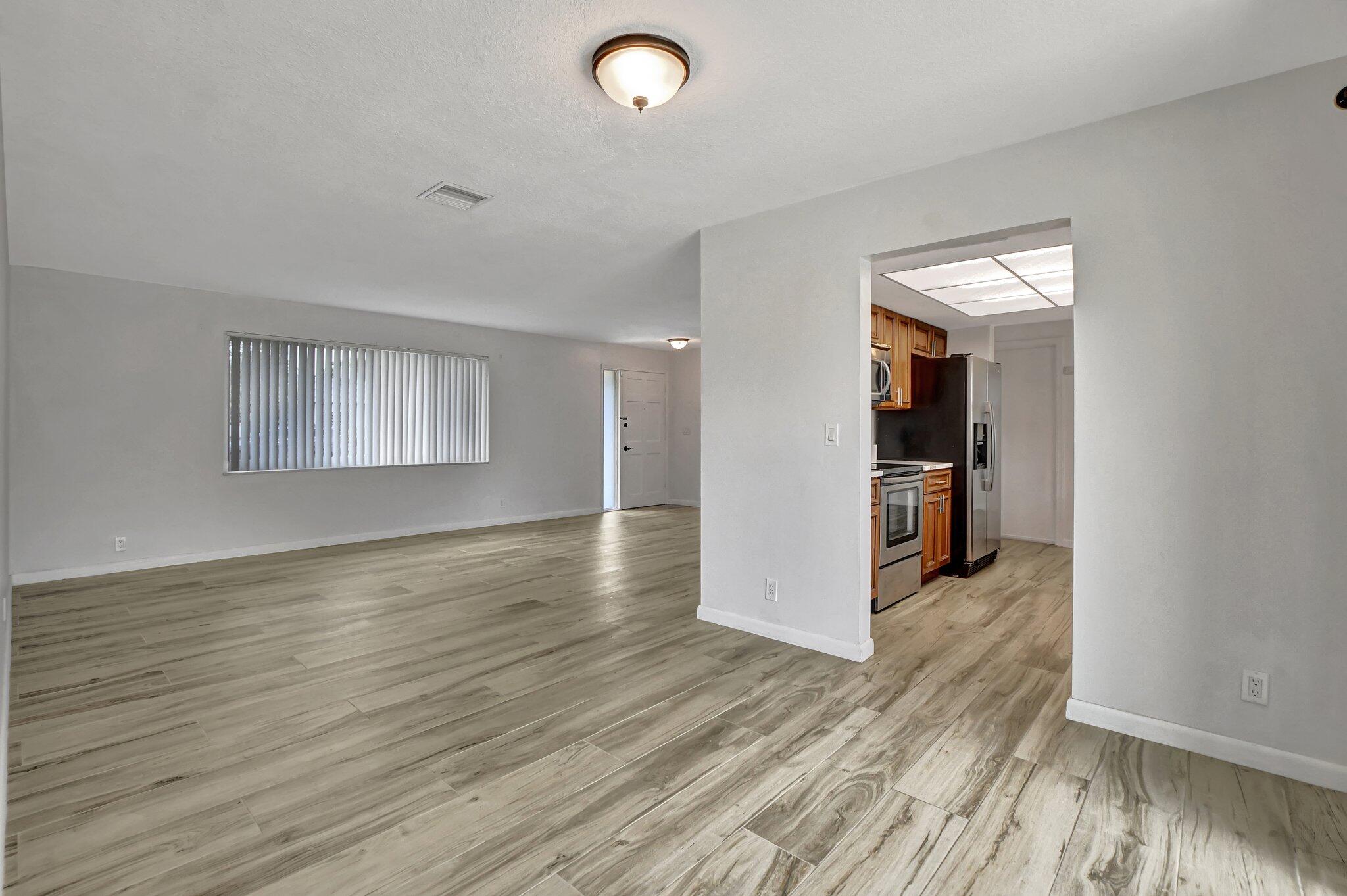 254 Northwest 11th Avenue Boca Raton, FL 33486 - Photo 11 of 59 Dining Room/Living Room