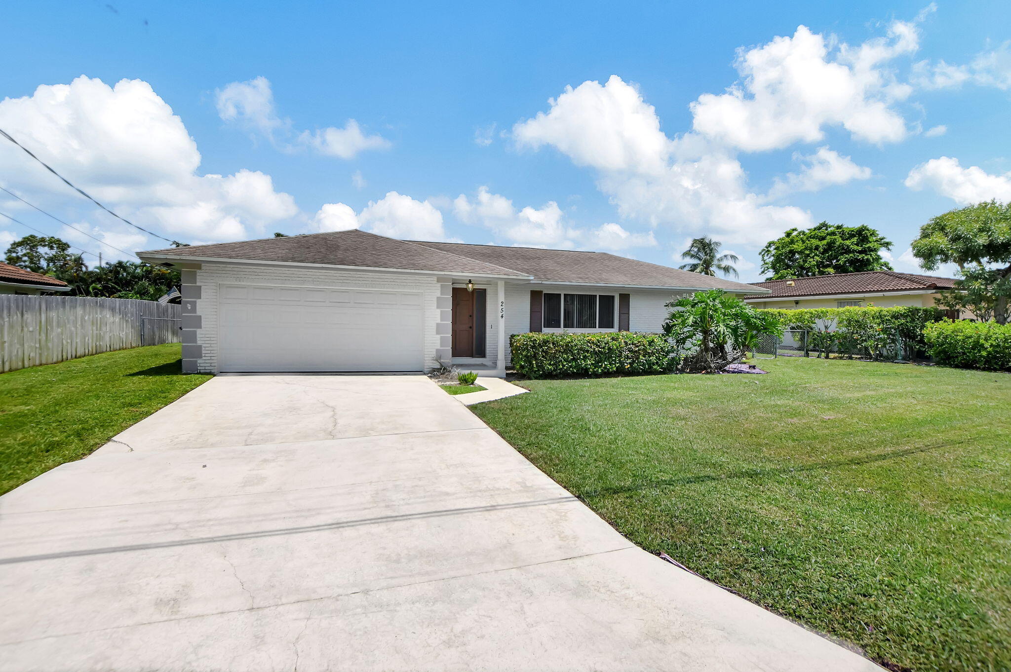 254 Northwest 11th Avenue Boca Raton, FL 33486 - Photo 3 of 59 Long Driveway ~ Low Traffic Street