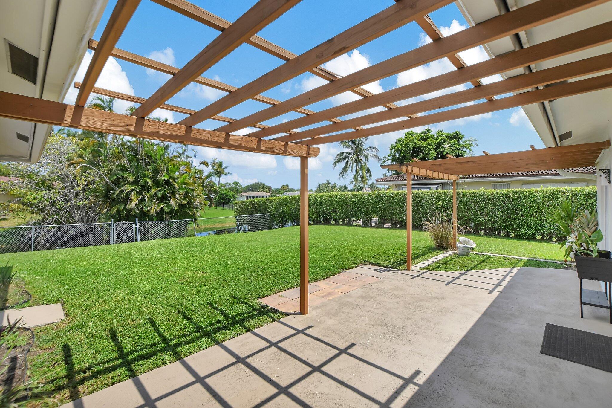 254 Northwest 11th Avenue Boca Raton, FL 33486 - Photo 48 of 59 Patio / Large Fenced Yard