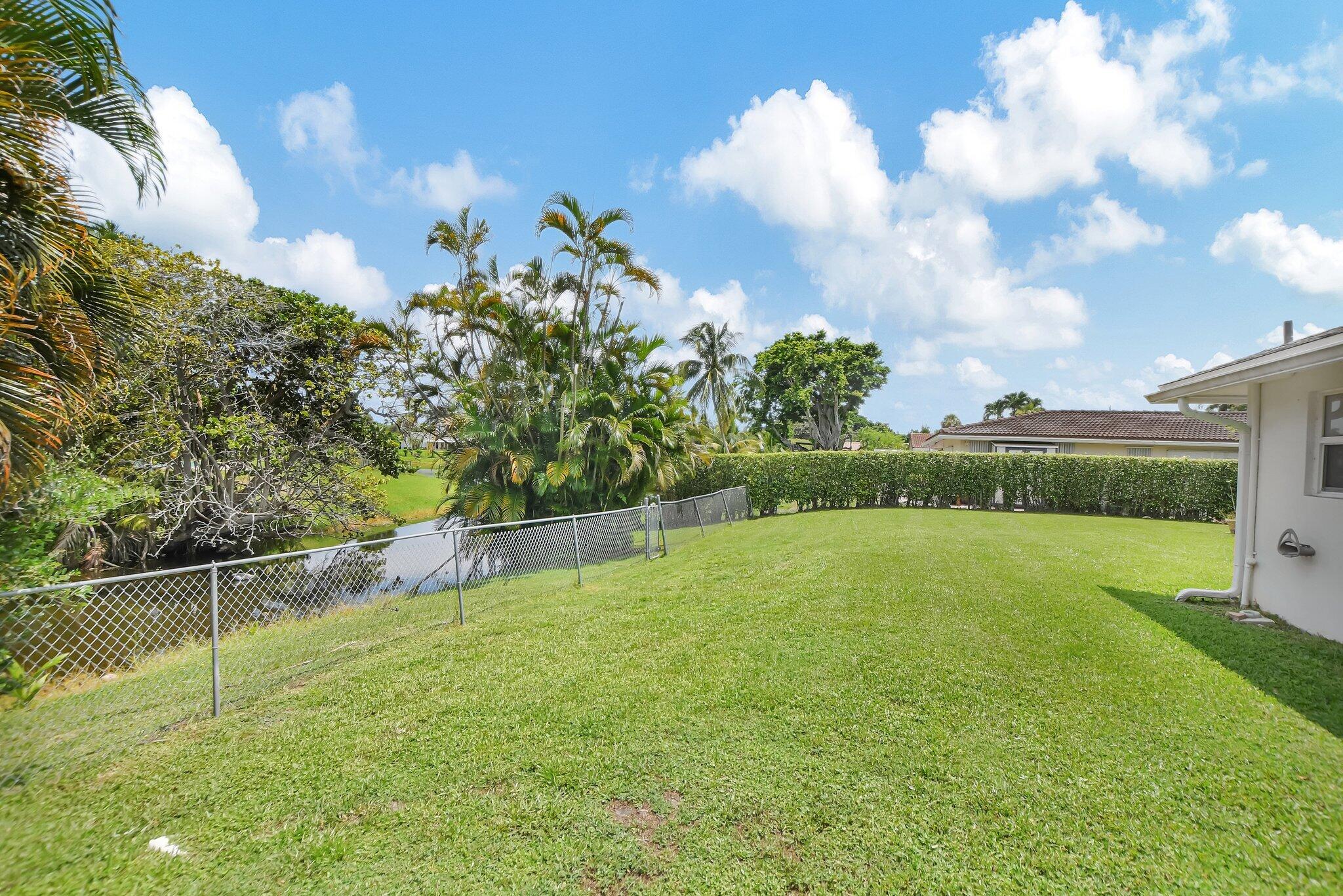 254 Northwest 11th Avenue Boca Raton, FL 33486 - Photo 59 of 59 Large Fenced Yard / Lake View