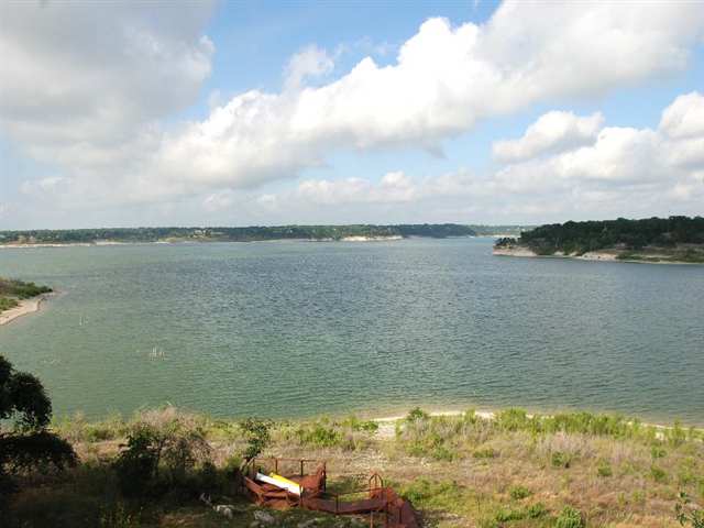 a view of a lake from a yard