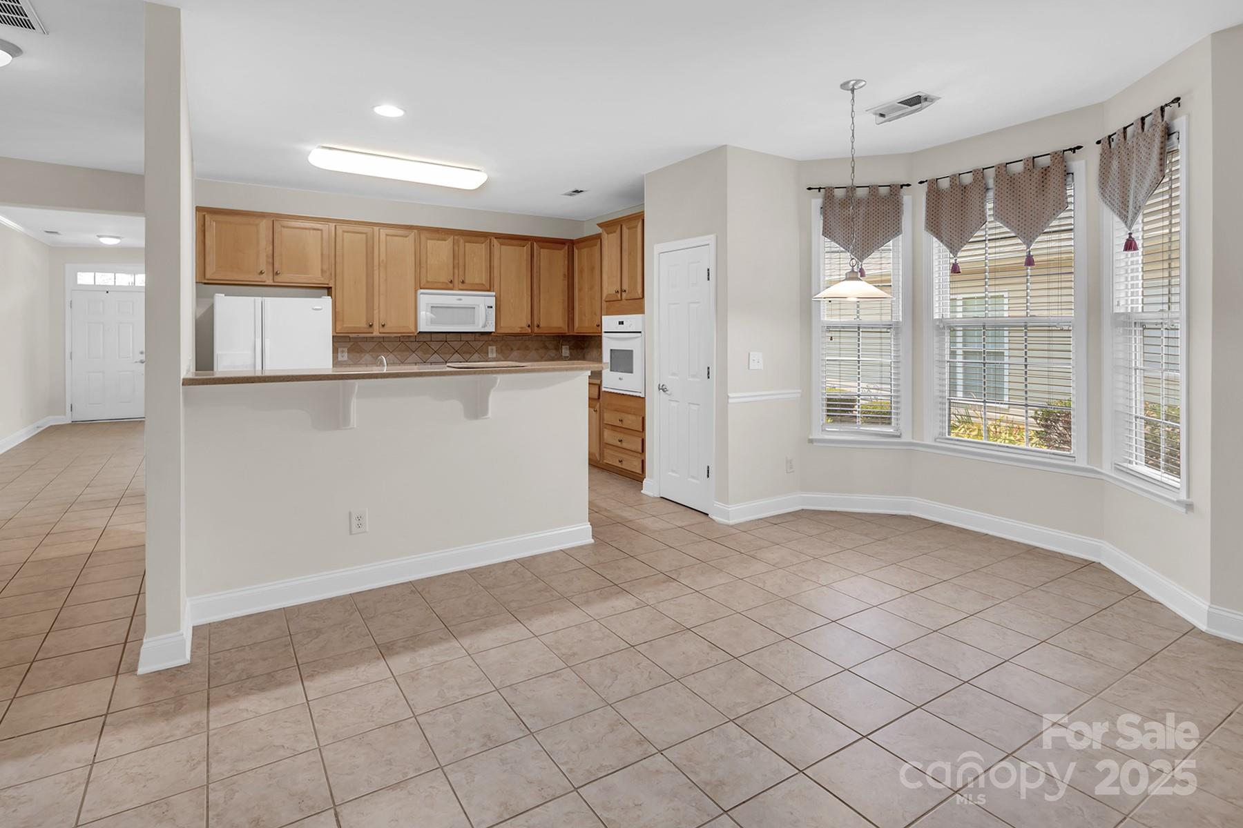 923 Platinum Drive Fort Mill, SC 29708 - Photo 11 of 34 a view of kitchen with windows