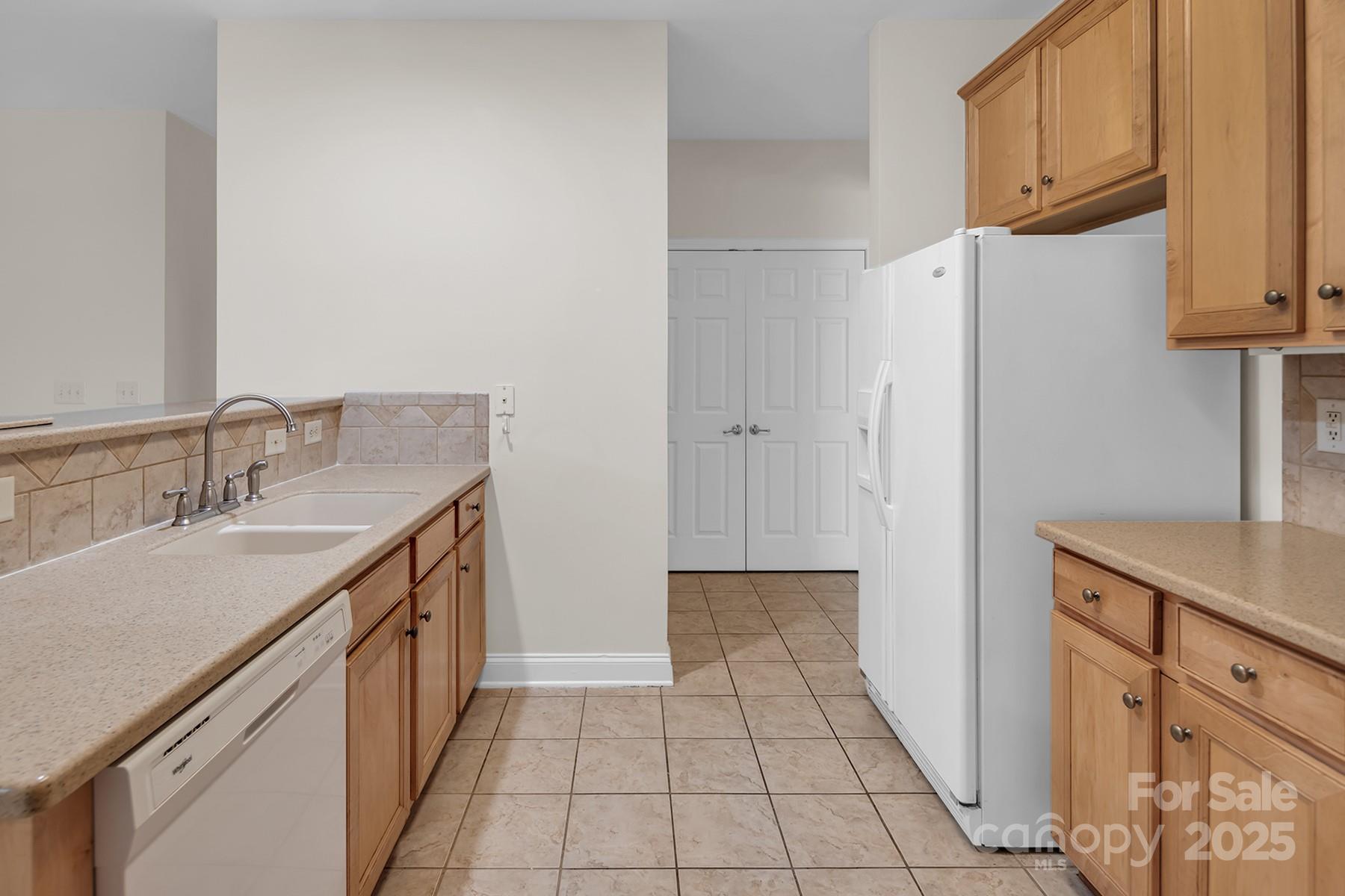 923 Platinum Drive Fort Mill, SC 29708 - Photo 15 of 34 a kitchen with granite countertop a sink and cabinets