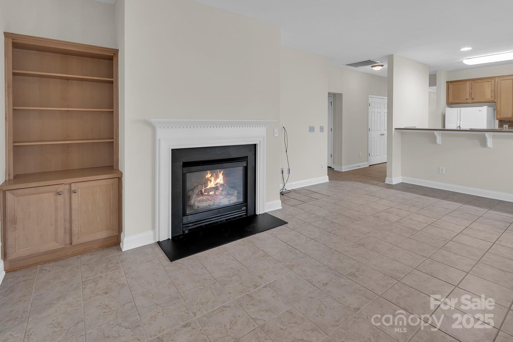 923 Platinum Drive Fort Mill, SC 29708 - Photo 16 of 34 a view of an empty room with a fireplace