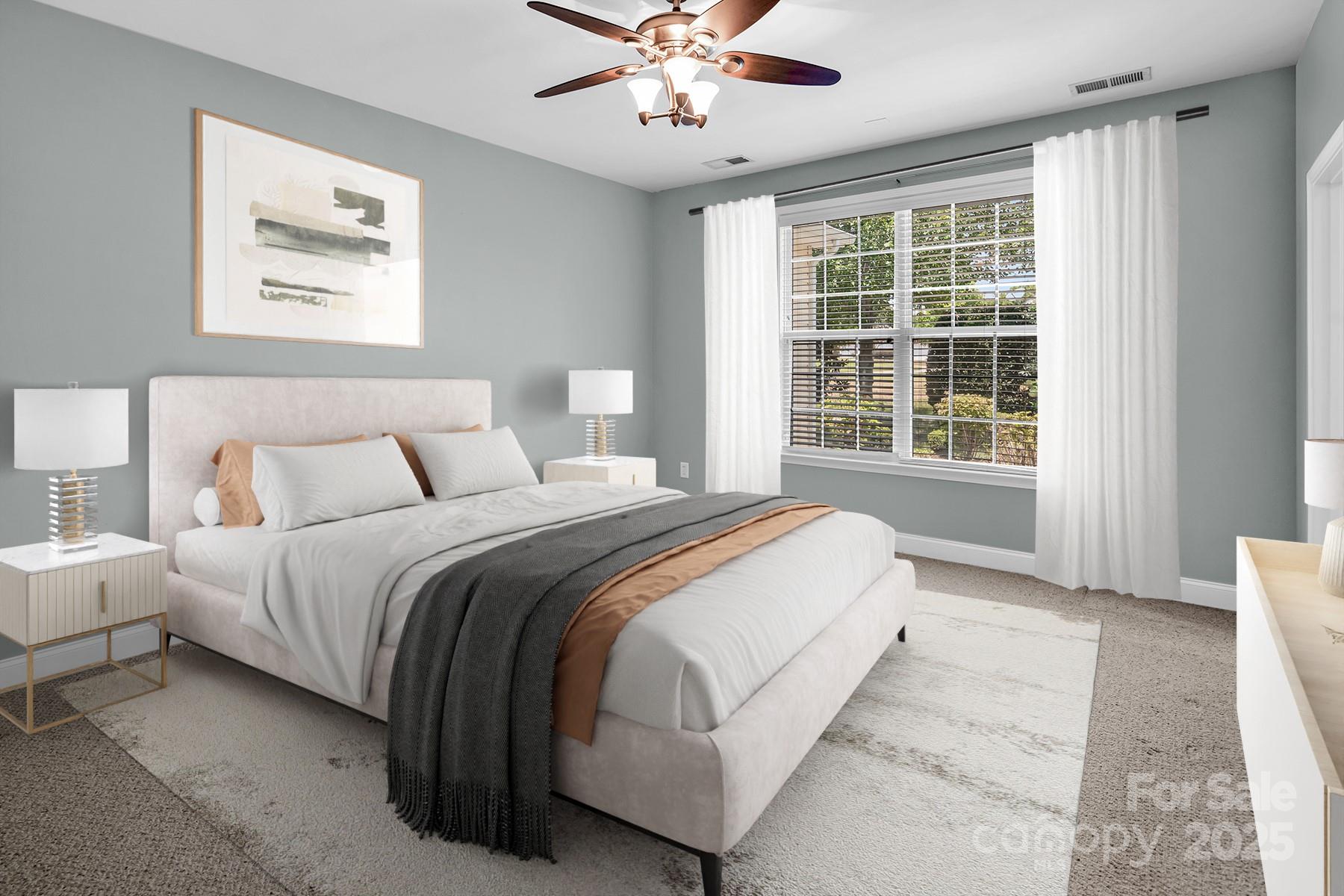 923 Platinum Drive Fort Mill, SC 29708 - Photo 19 of 34 a bedroom with a large bed and a window