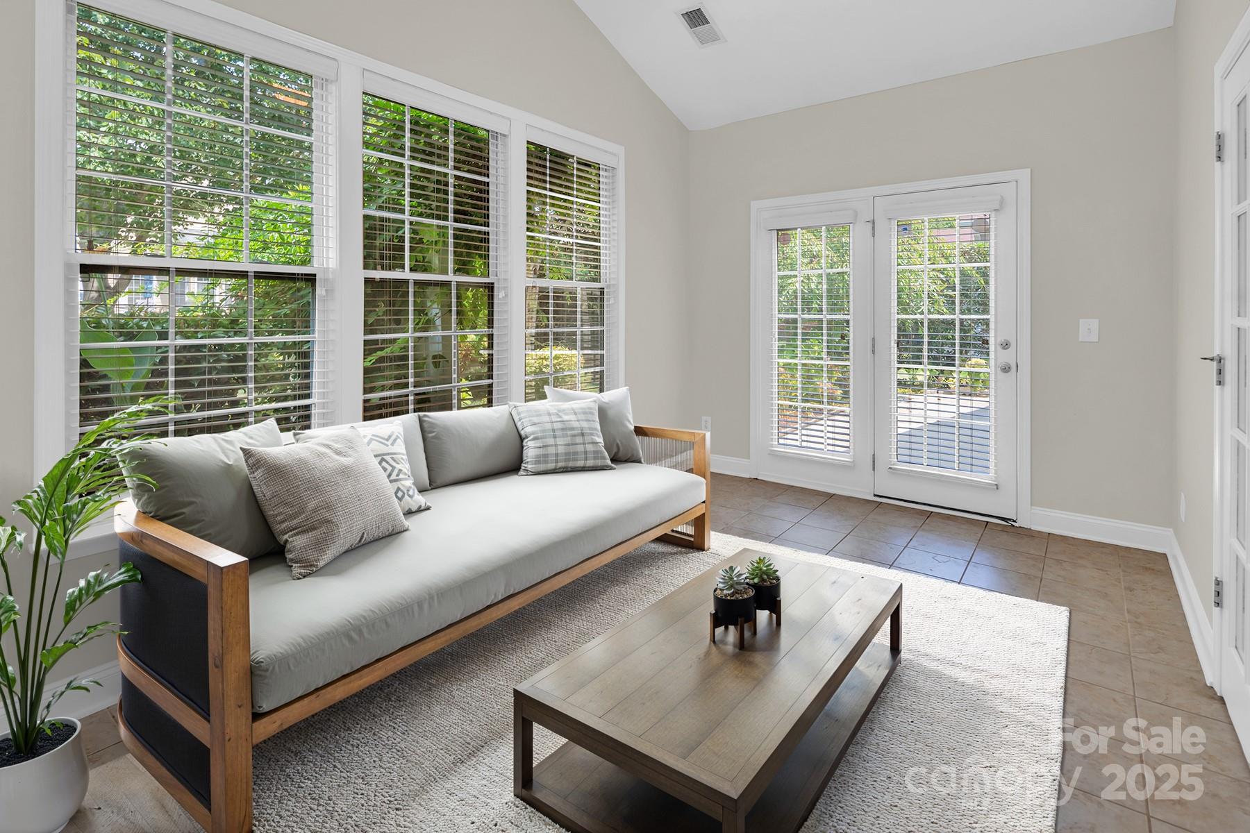 923 Platinum Drive Fort Mill, SC 29708 - Photo 26 of 34 a living room with furniture and a large window