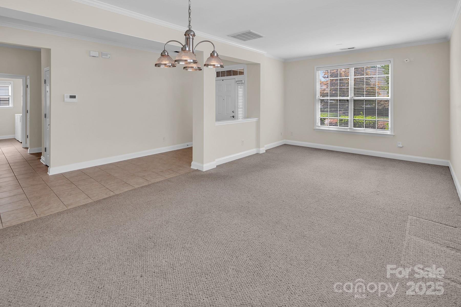 923 Platinum Drive Fort Mill, SC 29708 - Photo 6 of 34 a view of an empty room with a window