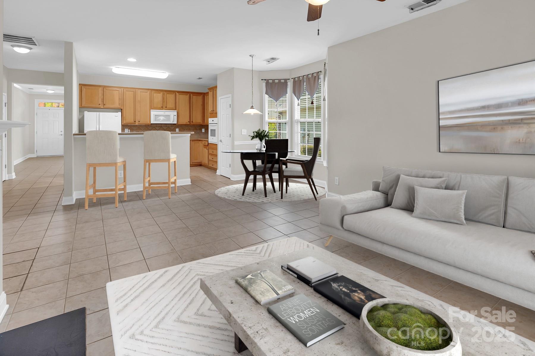 923 Platinum Drive Fort Mill, SC 29708 - Photo 8 of 34 a living room with furniture and a table