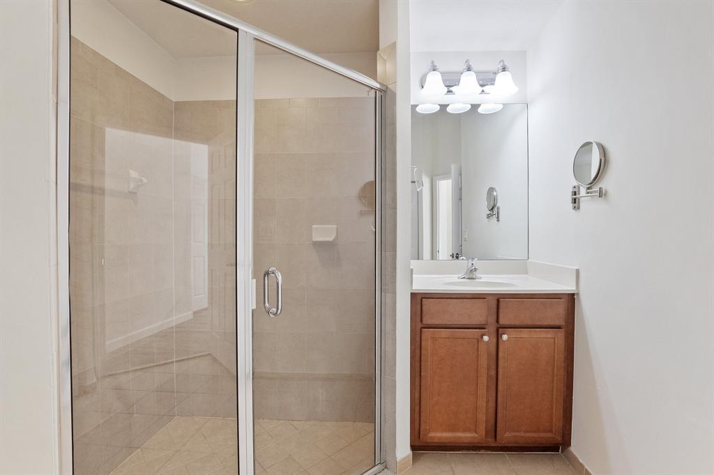 816 West Village Circle, Unit 1 Davie, FL 33325 - Photo 15 of 27 a bathroom with a double vanity sink mirror and shower