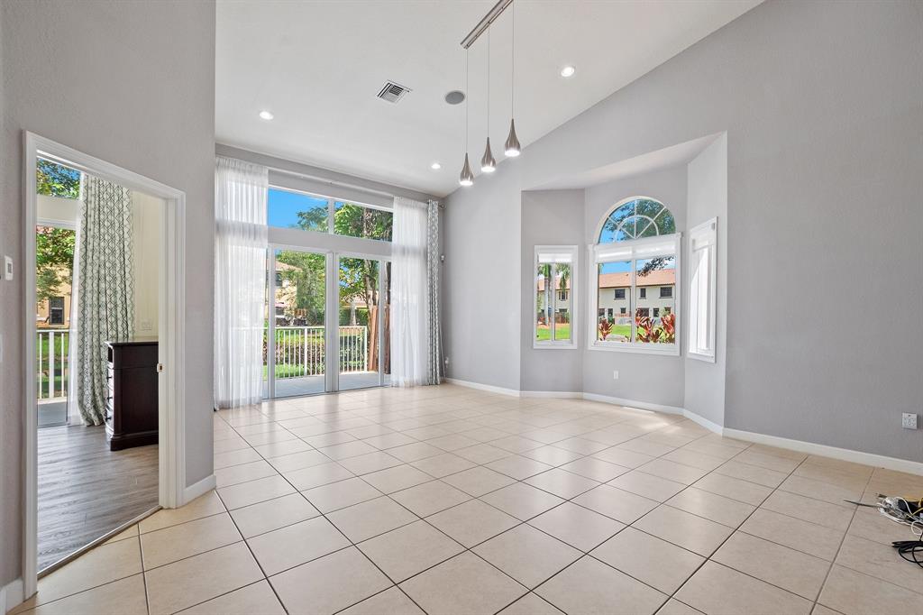 816 West Village Circle, Unit 1 Davie, FL 33325 - Photo 7 of 27 a view of an entryway with wooden floor