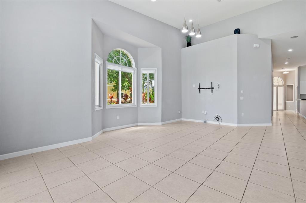 816 West Village Circle, Unit 1 Davie, FL 33325 - Photo 9 of 27 a view of an empty room with a window