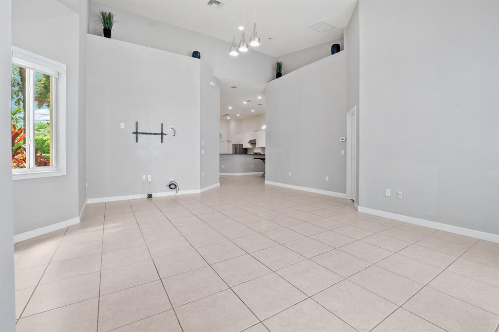 816 West Village Circle, Unit 1 Davie, FL 33325 - Photo 10 of 27 a view of an empty room and a window