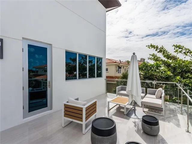 a outdoor living space with furniture and garden view