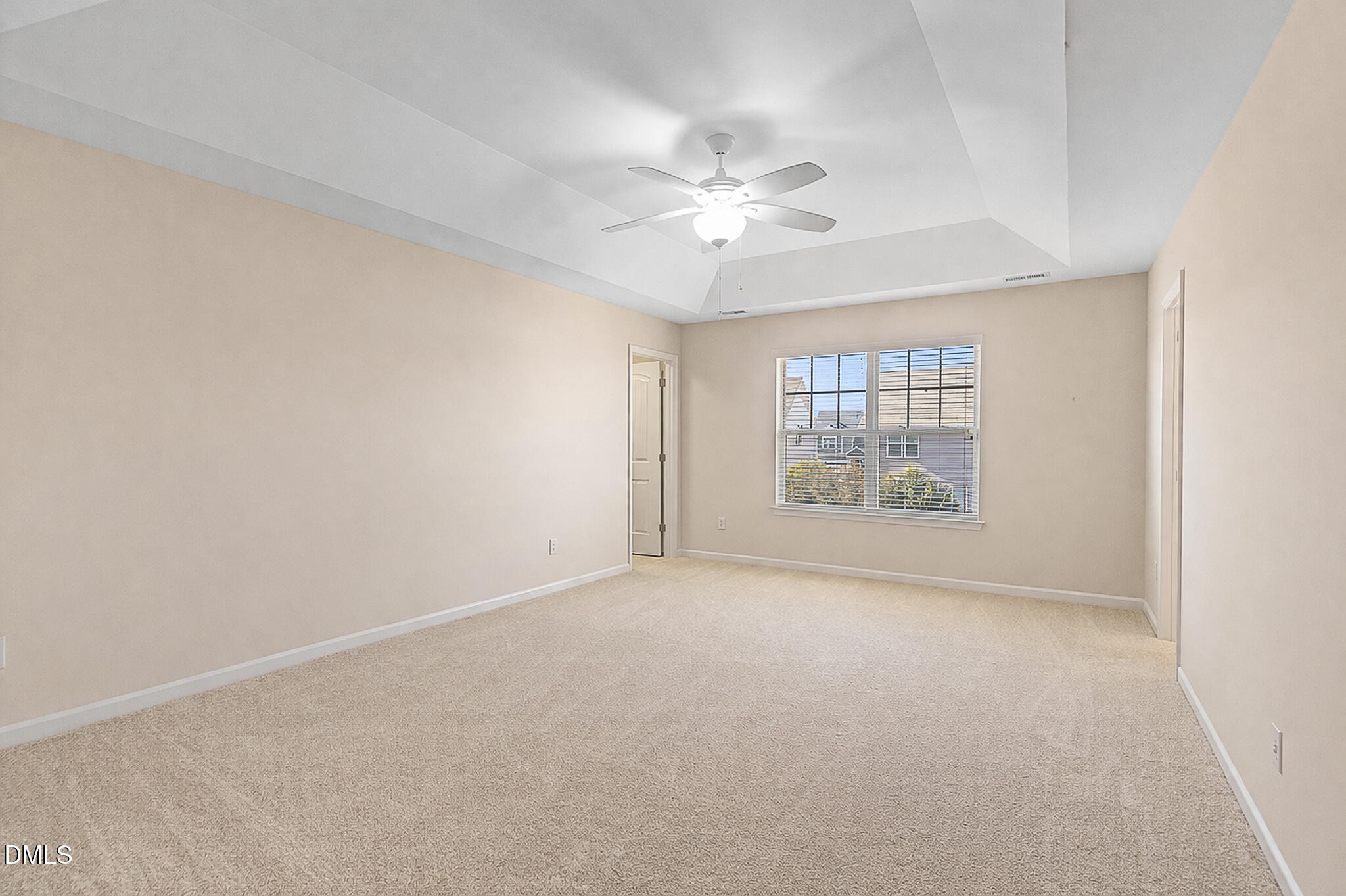 4249 Saubranch Hill Street Raleigh, NC 27616 - Photo 19 of 31 a view of an empty room with a window