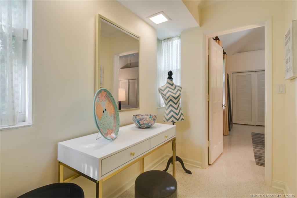 229 Colony Road Jupiter, FL 33469 - Photo 16 of 52 a view of entryway with kitchen