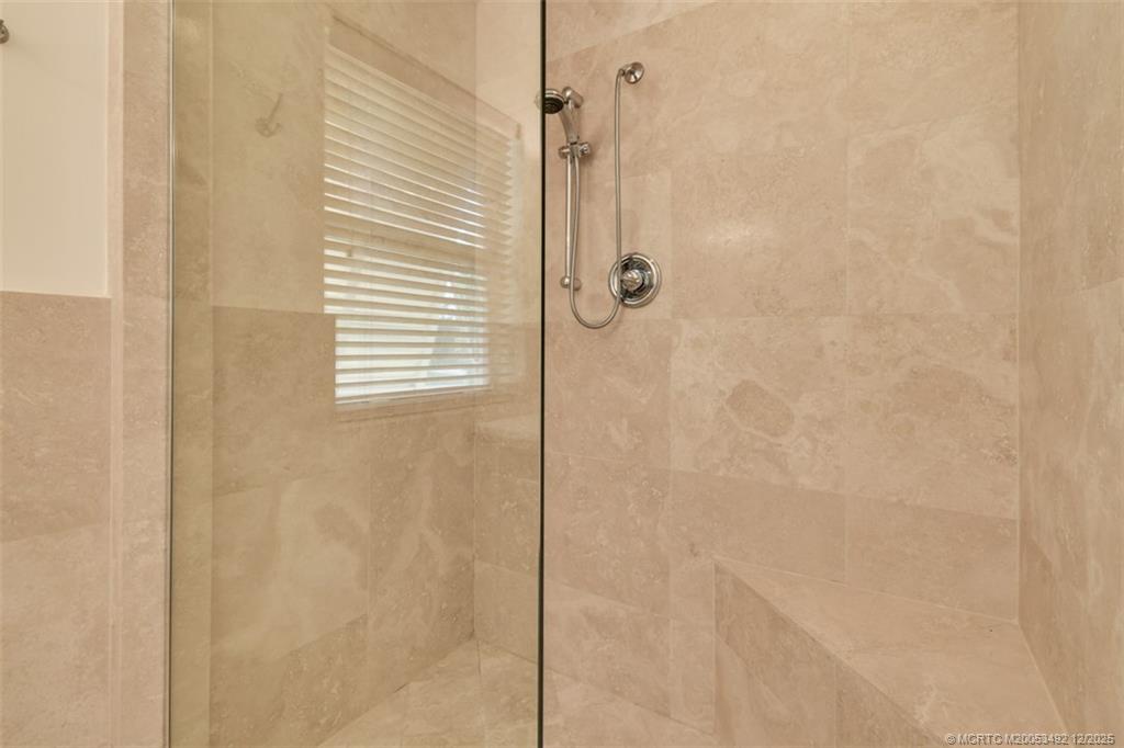229 Colony Road Jupiter, FL 33469 - Photo 23 of 52 a bathroom with a shower
