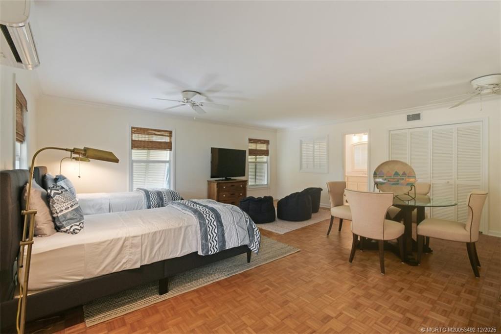 229 Colony Road Jupiter, FL 33469 - Photo 26 of 52 a bedroom with bed and a window