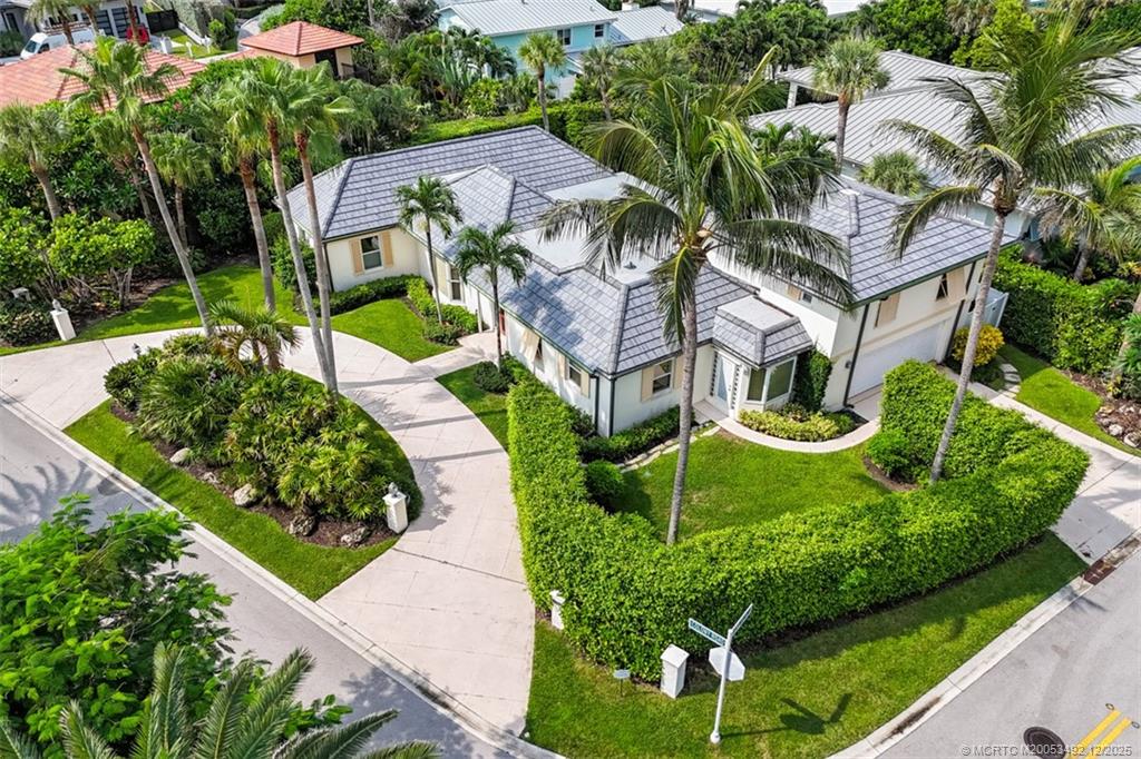 229 Colony Road Jupiter, FL 33469 - Photo 33 of 52 a aerial view of a house with a yard and potted plants