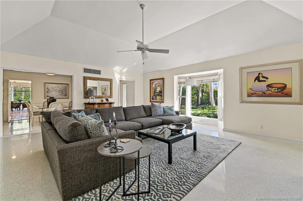 229 Colony Road Jupiter, FL 33469 - Photo 6 of 52 a living room with furniture a ceiling fan and a window