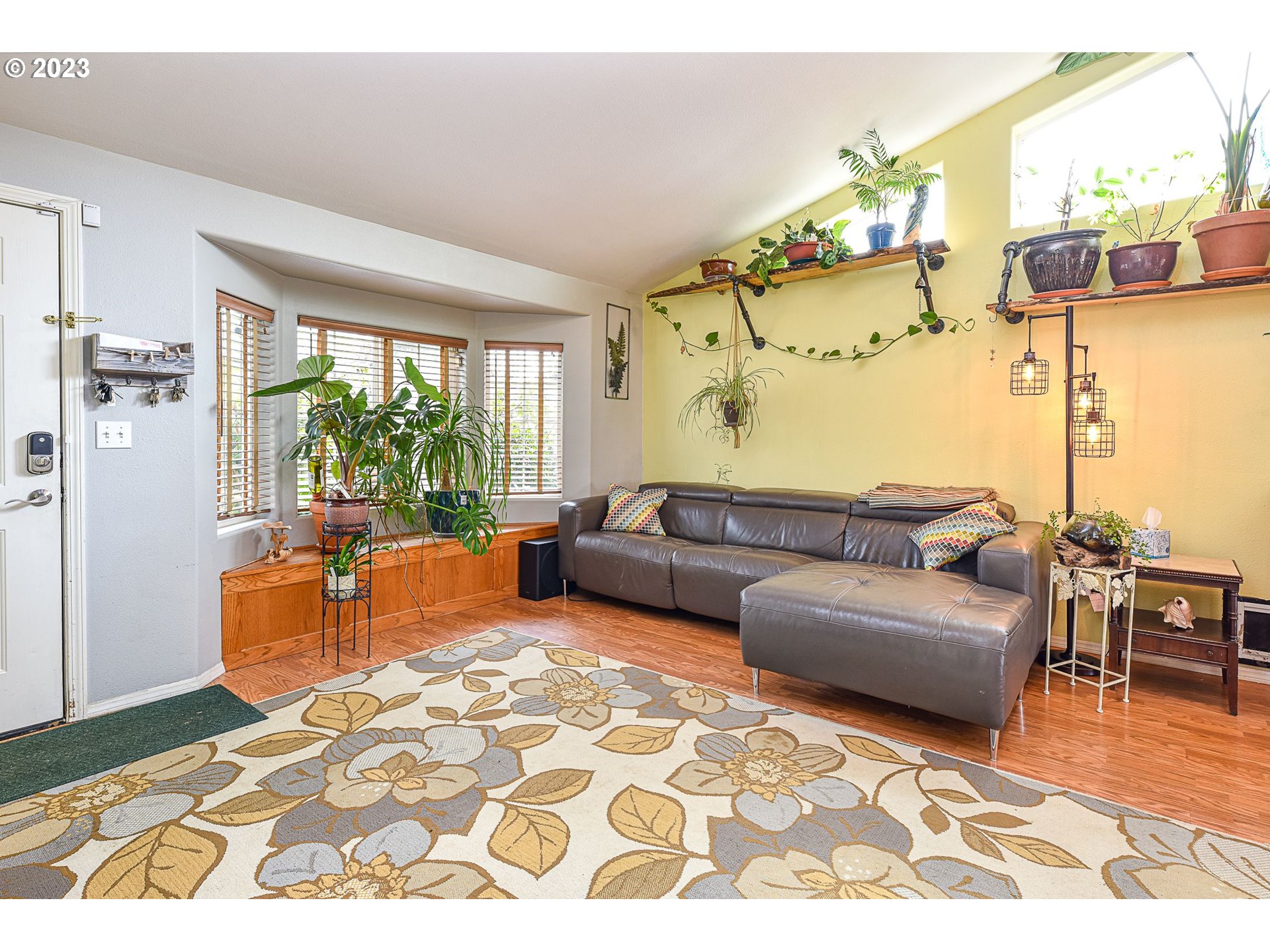 1161 Ash Grove Loop Creswell, OR 97426 - Photo 3 of 22 a living room with furniture and a large window
