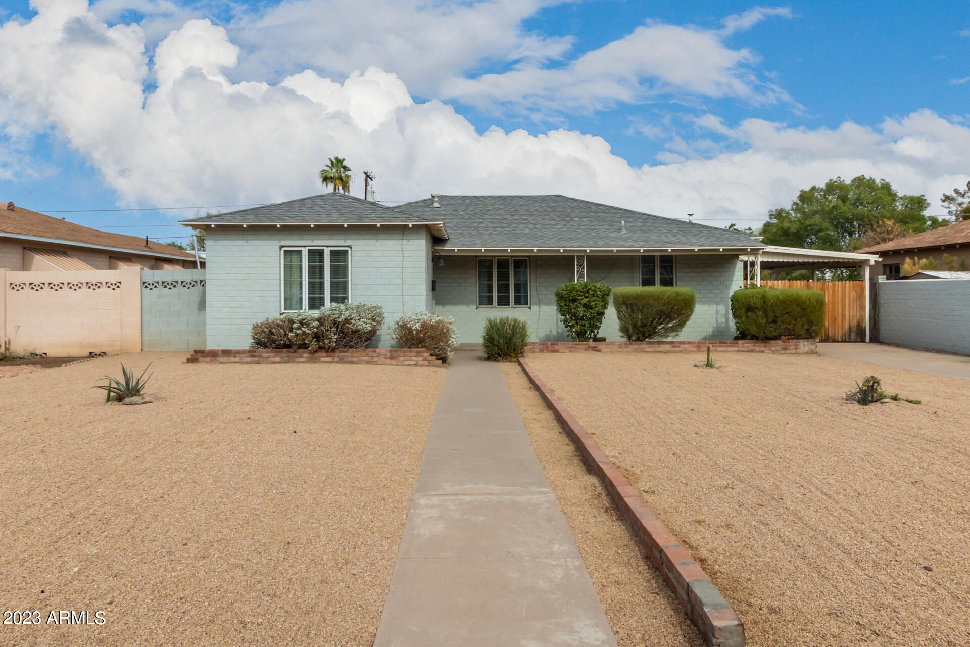 3015 North 17th Avenue Phoenix, AZ 85015 - Photo 2 of 27 a front view of a house with garage