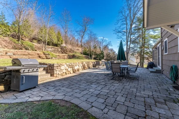 a view of a outdoor space with lounge chair and lounge chairs